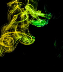 Colored smoke on black background