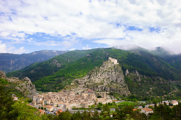 Panaramic view of medieval town of Entrevaux with its fortress on the cliff....