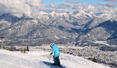 skier on the top of the mountain