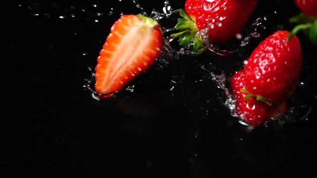 	Falling of strawberry. Slow motion.