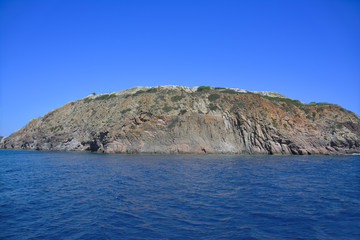 Fototapeta premium rocky coastline of the island in the Mediterranean Sea, in the bright sunny day