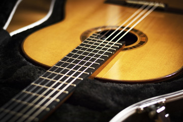 Fototapeta premium Classical guitar closeup, music background
