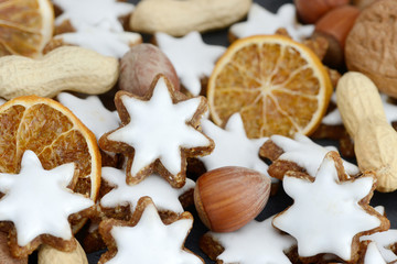 cinnamon  stars, orangen slices and nuts