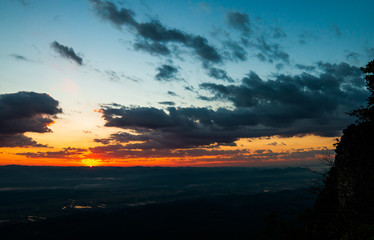 colorful dramatic sky with cloud at sunset.
