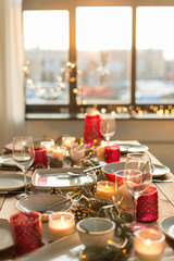 christmas, holidays and eating concept - table served for festive dinner at home
