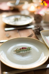 christmas, holidays and eating concept - table served for festive dinner at home