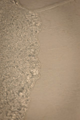 Small waves lapped the beach