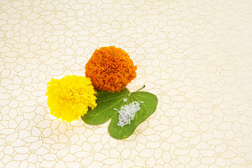 Dashera Festival apta leaf with marigold flower rangoli