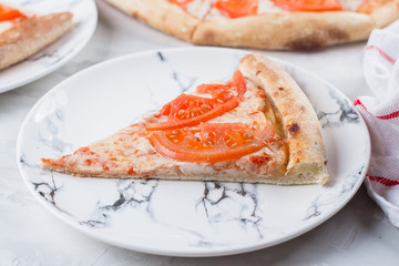 Italian food. Pizza Margherita Margarita with cheese, tomato sauce on a white background. Menu, restaurant concept, space for text, close up