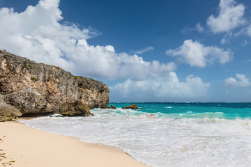 Fototapeta na wymiar Rugged cliffs at Bottom Bay on the Atlantic south east coast of the Caribbean island of Barbados in the West Indies.