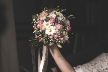 Wedding bouquet in bride hand