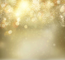 Fototapeta na wymiar Abstract festive winter bokeh background with fireworks and bokeh lights