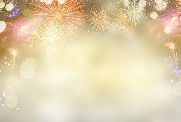 Abstract festive winter bokeh background with colorful fireworks and bokeh lights