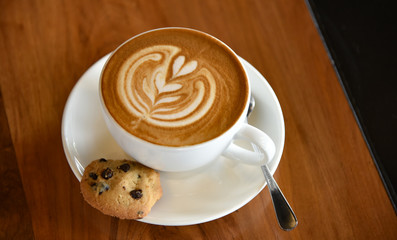 Nice coffee latte with cookie