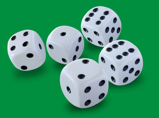 Five white dices size thrown in a craps game, yatzee or any kind of dice game against a green...