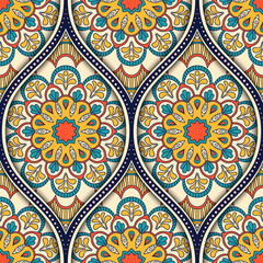 Seamless pattern with ethnic mandala ornament. Hand drawn illustration