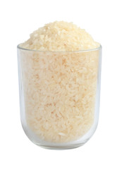White polished long grain uncooked raw rice in a transparent glass cup isolated on white background close up