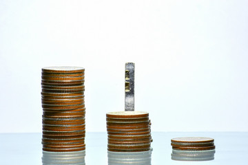 Money coin stack growing business on isolated White background, Key to Success concept.