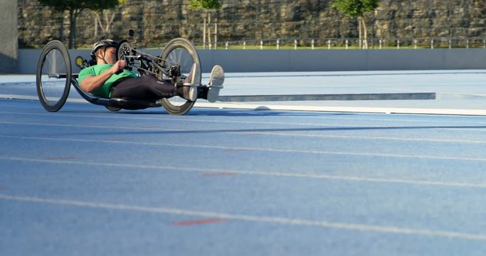 Disabled athlete racing in wheelchair