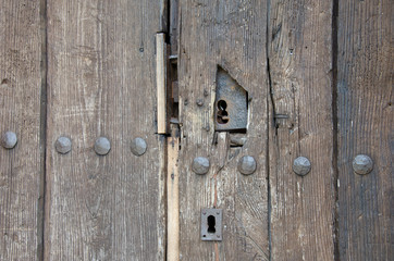 Old keyhole on wooden door