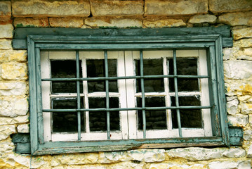 Fototapeta na wymiar Window security bars, Epirus region, Greece.