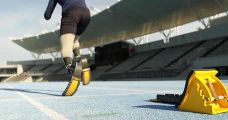 Disabled athletic running on a running track 4k - Powered by Adobe