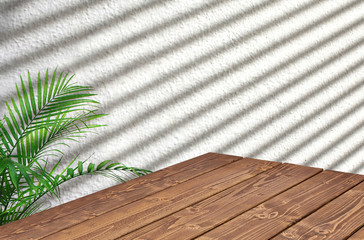 Wooden table corner on white background with blinds shadow