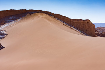 Fototapeta na wymiar Sand dunes in the Atacama Desert, Chile on a sunny day with blue sky