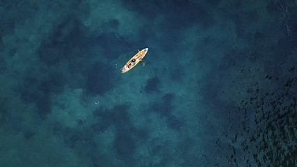 Kayak swimming above reef, aerial view, Thailand