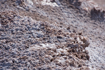 Sand dunes with salt deposits in the Atacama Desert, Chile on a sunny day with blue sky