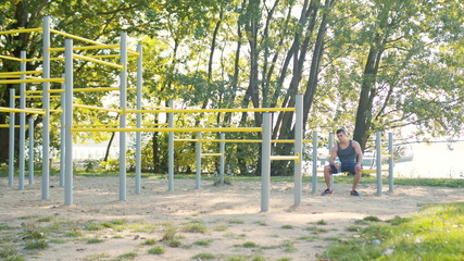 Fototapeta premium Caucasian Man Drinking Water with His Eyes Closed After Exercises