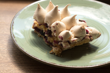 Cake with cream and coffee.
