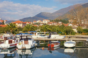 Fototapeta na wymiar Picturesque Mediterranean landscape on a sunny winter day. Montenegro, Tivat city, view of Marina Kalimanj
