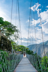 Wood bridge over forest valley in Hidalgo Mexico