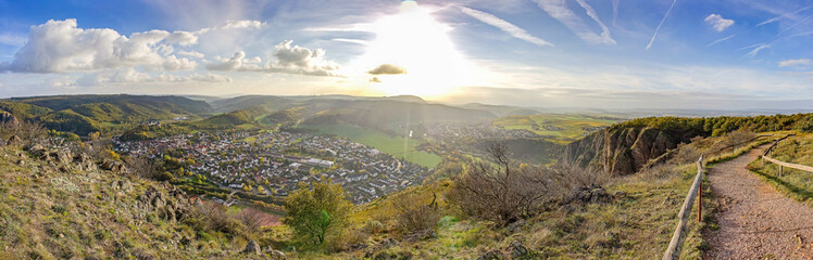 Panorama photo of the setting sun from mountaintop in Bad Münster am Stein, Germany