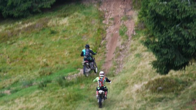 Mountain Motocross in Romania  - Two riders go uphill

