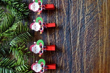 Christmas backgrounds. Christmas decor on the wooden background.
