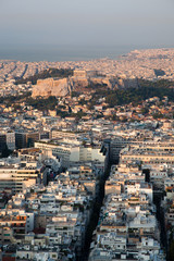 Fototapeta premium cityscape of Athens in early morning with the Acropolis seen from Lycabettus Hill, the highest point in the city