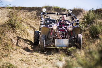 Fototapeta premium Man riding off road vehicle