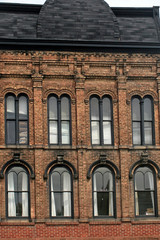 Facade with Double and Single Arch Windows