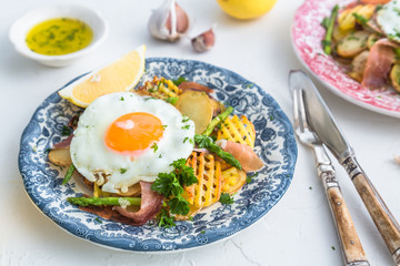 Huevos rotos, eggs, potatoes and serrano ham.