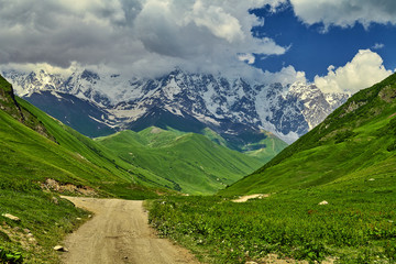 Fototapeta premium Beautiful landscape of mountain Georgia. Caucasus mountains and ancient national villages.