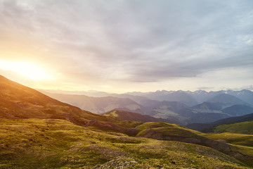 Naklejka na ściany i meble Beautiful sunset in the mountains of Georgia, the Caucasus Mountains