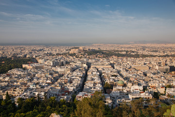 cityscape of Athens in early morning with the Acropolis seen from Lycabettus Hill, the highest point in the city