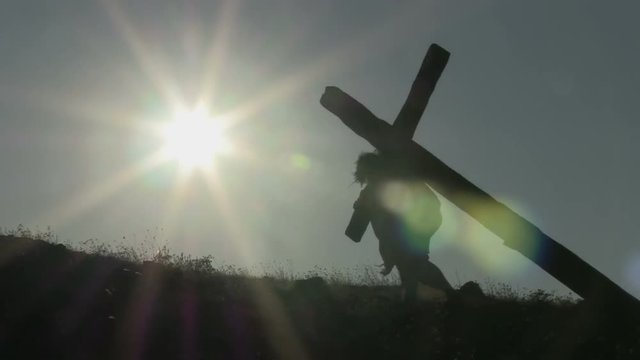 Representation of Christ carrying the cross road to Calvary hill.