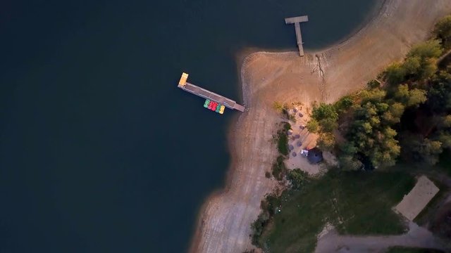 4k aerial with boats on Lake Solina in Bieszczady mountains. Top down aerial video. 3840x2160, 30fps.