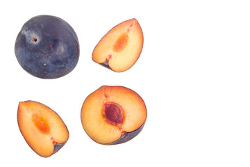 plums isolated on a white background with copy space for your text. Top view. Flat lay pattern