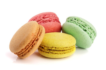 four macaroons isolated on white background closeup