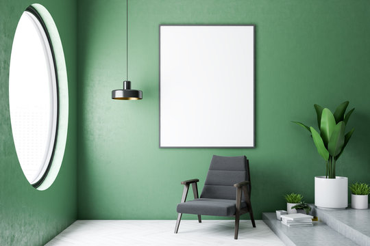 Green bathroom interior, armchair and poster