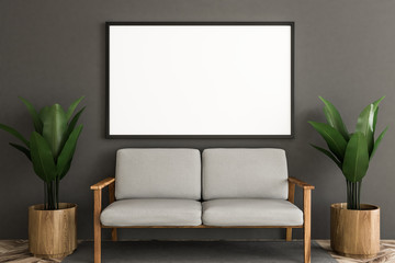 Gray room with sofa and poster